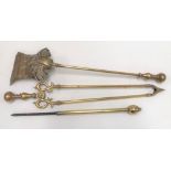Set of three brass fire irons, including poker, shovel and tongs.
