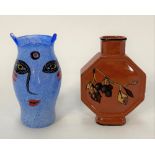 A Kosta Boda 'Artist Collection' art glass vase painted with a face, inscribed inscription and