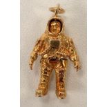 A 9ct gold pendant charm modelled as a spaceman, length 23mm, 5.4g.