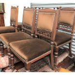 A set of six Victorian walnut dining chairs with upholstered back and stuff over seats, upon