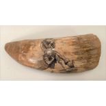 An antique Scrimshaw sperm whale tooth engraved with two pirates, length 15.5cm