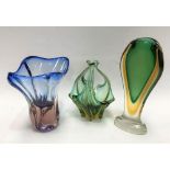 Three art glass coloured vases, the tallest 27cm.