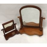 Victorian mahogany swing mirror with arched plate, height 61cm; together with another smaller