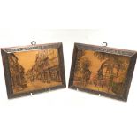 A pair of rectangular poker work panels, depicting buildings in Coventry and with inscriptions,