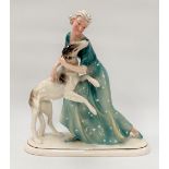 An Art Deco German porcelain group depicting a woman and Afghan hound by Porzllanfabrik Hertwig &