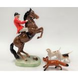 A Beswick pottery hunter and horse group, no. 868, height 25cm (right front foot AF); together