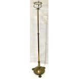 An early 20th century brass telescopic standard lamp for an oil lamp, the top with circular 6in