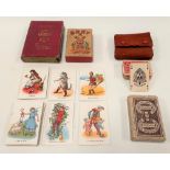 Four packs of playing cards, including Waddington's Lexicon card game, Snap Pantomime series and