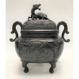 A 19th Century Japanese bronze lidded censer, of square section, the lid applied with mythical