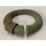 Viking bronze thick cast Omega penannular brooch with flared terminals (pin missing), width 4.5cm.