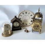 A small brass cased lantern type timepiece with quartz movement, 29cm; together with a small torsion