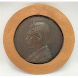 A bronze circular plaque of Edward VIII, within later frame, diameter 33cm.