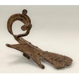 An African Benin tribal bronze finger ring in the form of a stylised bird, length 18cm.