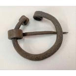 Viking bronze penannular brooch with coiled and facet head terminal and with pin, width 5cm.