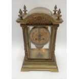 A good French brass four glass, two train clock by J. Marti & Cie, striking on a gong, the 3.5'