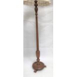 Teak turned standard lamp, height 155cm.