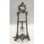 A Rococo style brass table easel, height 56cm (AF)