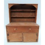 A miniature pine dresser, the raised back with two shelves, the base with a long drawer and two