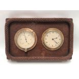 A ship's portal timepiece and aneroid compensated barometer within an oak rectangular case with rope