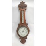 An oak cased aneroid banjo barometer, height 90cm (AF)