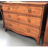 19th Century mahogany straight front chest of three long drawers upon outswept feet, width 120cm.