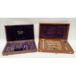 Two early 20th century cased optician's sets, one by Eduard Messter, Berlin, with contents, one