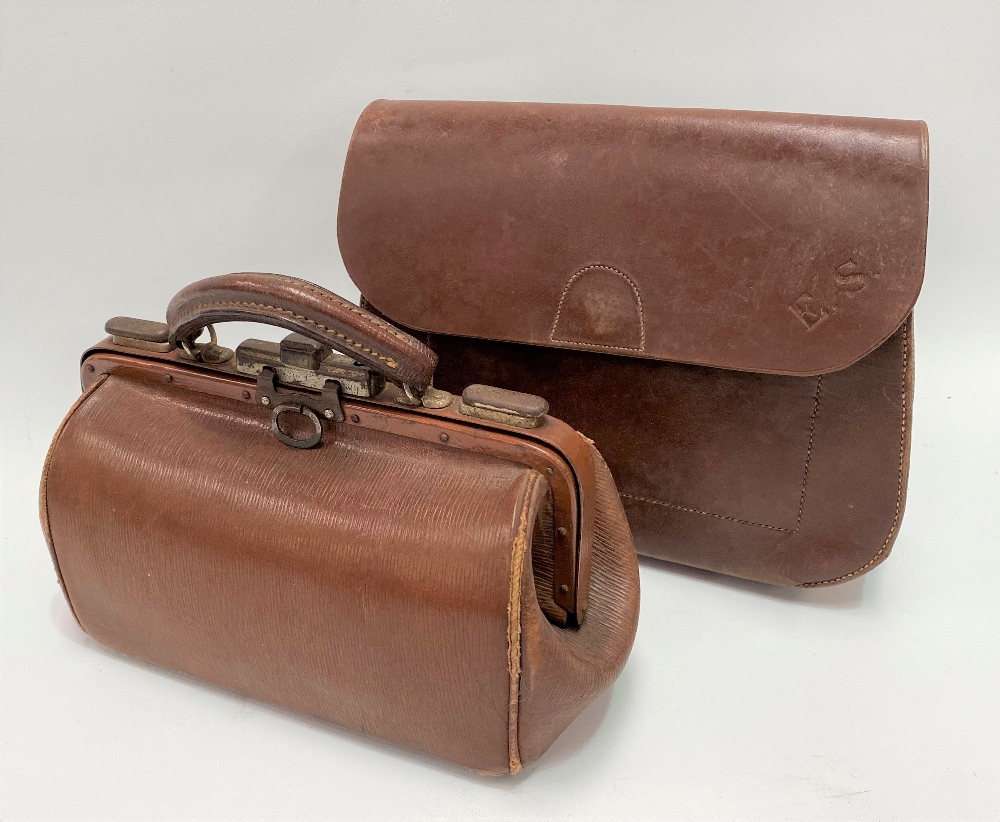 A small leather Gladstone bag, width 28cm, together with a leather satchel.
