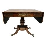 A good Regency rosewood brass inlaid pedestal sofa table, the top brass strung over the frieze, with