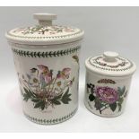 A large Portmeirion cylindrical lidded storage jar, height 37cm; together with a smaller storage
