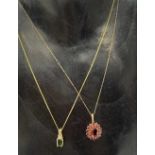 A 9ct. gold garnet set cluster pendant necklace, together with a 9ct. gold green sapphire and