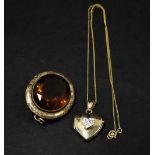 A 9ct. gold CZ set heart shaped pendant locket upon 9ct. gold chain, weight 3.2g approx., together