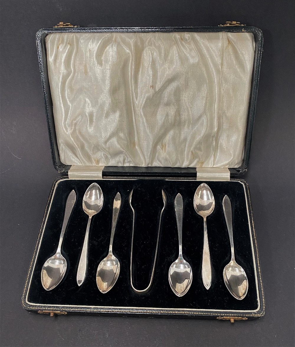 A set of six George VI silver teaspoons, together with sugar tongs, maker A.S.P.Co, Sheffield