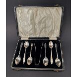 A set of six George VI silver teaspoons, together with sugar tongs, maker A.S.P.Co, Sheffield