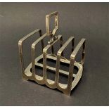 A George V silver four section toast rack, maker Harrison Brothers & Howson, Sheffield 1923, width