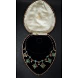 A good early 20th century 9ct. gold, turquoise and mother of pearl set drop pendant necklace, each