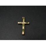 A yellow metal hardstone set cross pendant with foliate chased decoration, length 40mm, weight 2.