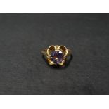 A 9ct. amethyst set ring, the amethyst measuring 1ct. spread approx., stamped 9ct., size 17.5mm