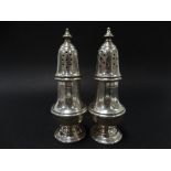 A pair of modern silver baluster casters, height 12cm, weight 4.65oz approx.