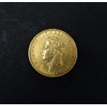 A George IV 1829 sovereign, weight 8g.