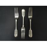 A Victorian silver set of three Fiddle pattern table forks by George Bower, London 1884, weight 7.