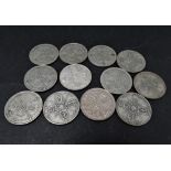 Twelve George V .500 silver One florin coins, weight 133.9g approx.