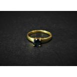 A 14ct. gold sapphire set solitaire ring, the circular cut stone measures 0.50ct. spread approx.,