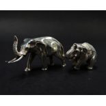 A 925 silver weighted miniature elephant, width 5cm, together with another white metal miniature