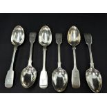 A Victorian silver Fiddle pattern set of four dessert spoons by George Aldwinckle, three are