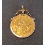 An Edward VII 1905 9ct. gold mounted pendant, weight 5.3g approx.