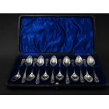 A Victorian silver cased set of twelve demi tasse spoons, maker L&S, Birmingham 1900, weight