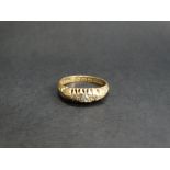 An Edwardian 18ct. hallmarked gold diamond set five stone ring, the central larger diamond of 0.