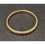 An 18ct. hallmarked gold band ring, Birmingham 1930, weight 2.6g approx.
