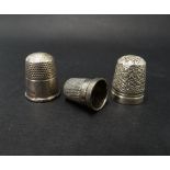 A Victorian silver thimble, together with two other silver thimbles, weight 18.5g approx.