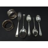 A modern silver christening fork and spoon, together with a set of three silver hallmarked teaspoons